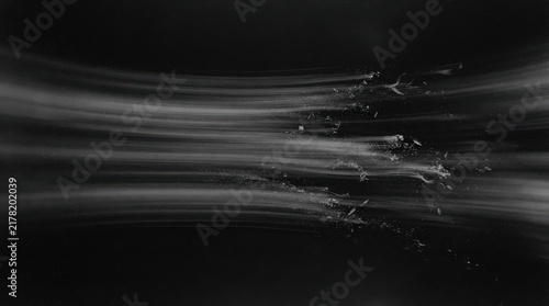 Abstract shattered glass explosion with dynamic lines in black and white