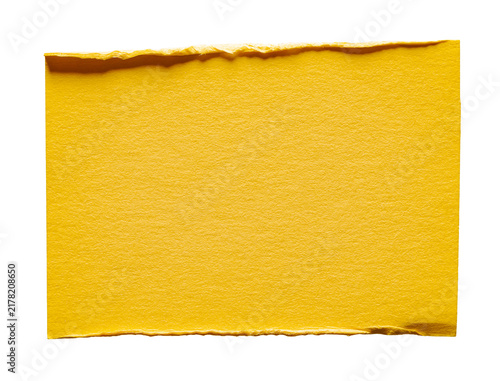 Isolated cut out piece of yellow paper with creases and copy space for text, design element background