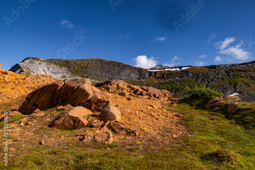 Konstfotografi A beautiful mountain nature reserve landscape with bright orange rock outcrops