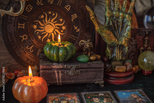 Canvastavla Mystical occult background with tarot cards, burning pumpkin candles, and esoter