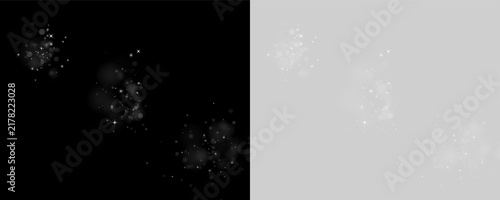 Obraz na płótnie Clusters of soft white sparkles float against a dark background