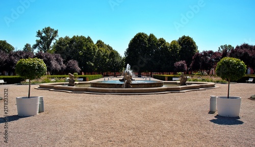 Canvas Print Prague, Czech Republic – Ornamental fountain in formal Baroque garden of Troja Chateau surrounded by trees and landscaped grounds