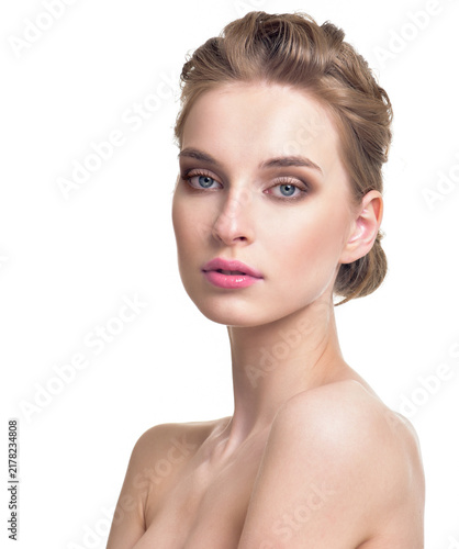 Beautiful Young Woman with Clean Fresh Skin. Close up Portrait.  Fashion Model Girl Face. Perfect Skin. Professional Makeup, gloss lips.