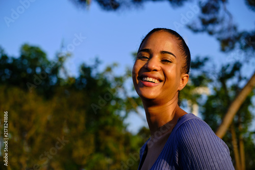 headshot of Young woman smiling, enjoying outdoor happy lifestyle in barcelona