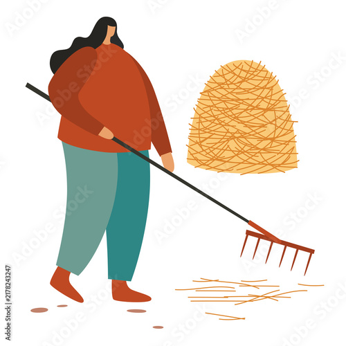 Quadro su tela Woman farmer using a rake beside a haystack and scattered straw