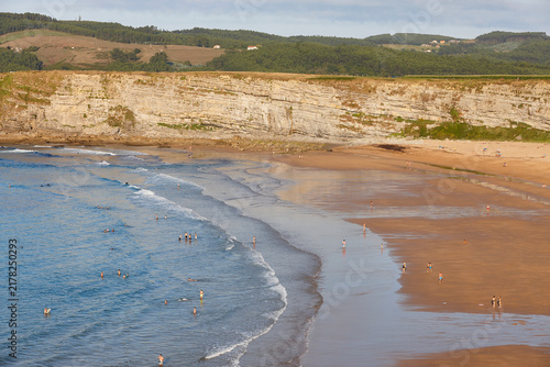Sand beach in Cantabria at sunset. Atlantic ocean. Langre, Spain