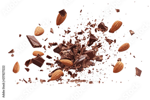 Chocolate chunks and almonds explosion isolated on a transparent background