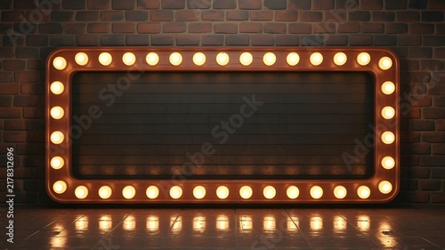Retro illuminated marquee sign with many light bulbs against a rustic dark brick wall