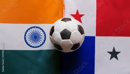 soccer ball placing between india flag and panama flag