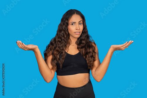 Obraz na płótnie Woman shrugging with hands up, expressing confusion