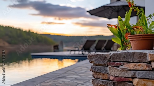Serene poolside retreat with stunning sunset views providing a luxurious relaxation spot