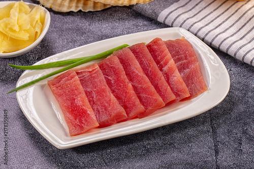 Canvas Print Raw tuna sashimi slices with ginger and green onion