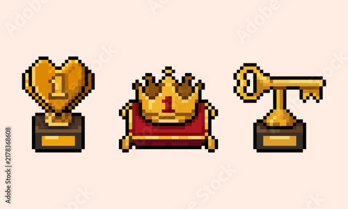 pixel art of golden heart trophy, crown on red pillow, and key award set, perfect for RPG game UI
