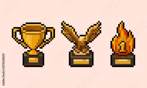 pixel art of golden trophy cup, eagle award statue, and flaming flame number one trophy, perfect for RPG game UI, retro video game assets