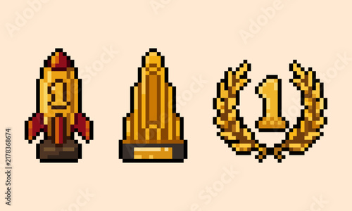 pixel art of game trophies set with rocket award, golden skyscraper, and laurel wreath number one badge, perfect for RPG game UI.