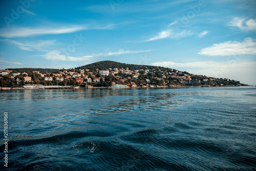 Фотография Coastal town on a hillside overlooking the sea