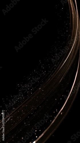 Midnight black Christmas background with flowing metallic gold ribbon, scattered sparkles and generous copy space for elegant dark festive designs.