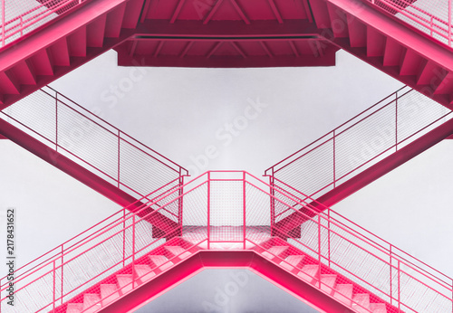Neon Pink Geometric Staircase Design - Modern Symmetrical Architecture