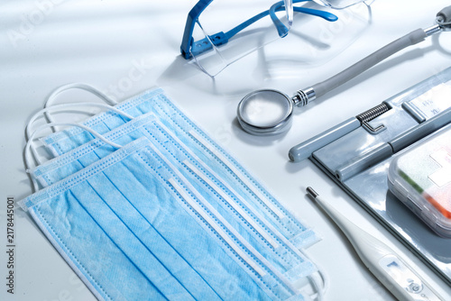 Medical Supplies and Surgical Masks on White Background