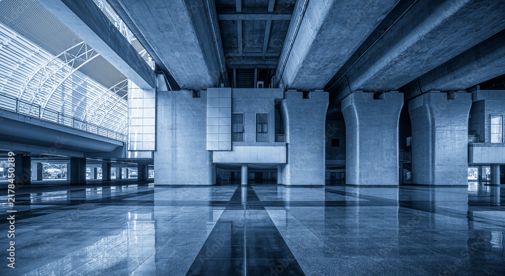 Naklejka premium Captivating Architectural Space with Elegant Blue Tones and Modern Design
