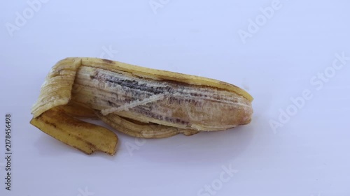 Peeled Rotten Banana Showing Spoiled Internal Pulp on White Background - Food Waste, Fruit Decay, and Quality Control Concept