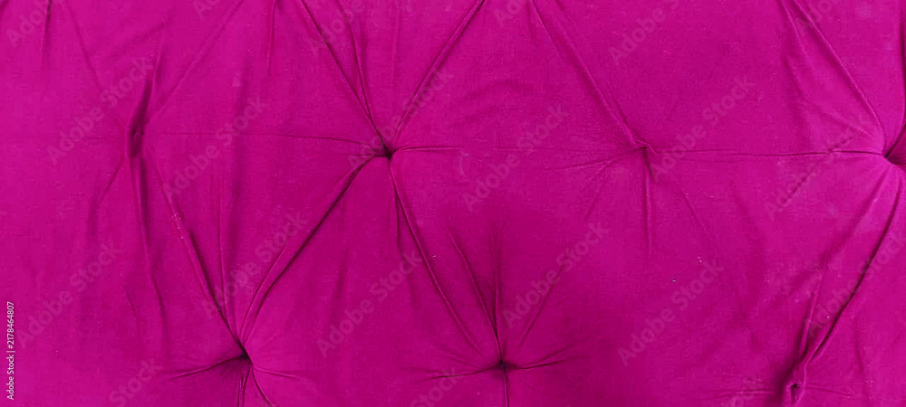 Obraz premium Magenta velvet tufted upholstery texture, luxury pink fabric headboard background, elegant quilted textile material for interior design
