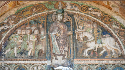 Medieval relief depicting Saint Zeno with narrative scenes in Verona, Italy