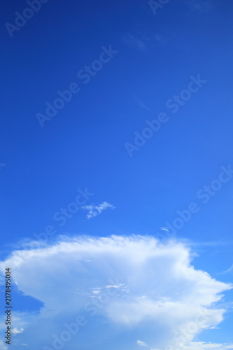 Large Cumulonimbus Cloud Rising in a Blue Summer Sky