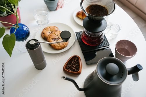 Cuadro en lienzo Manual pour over coffee brewing setup with V60 dripper, paper filter, freshly gr