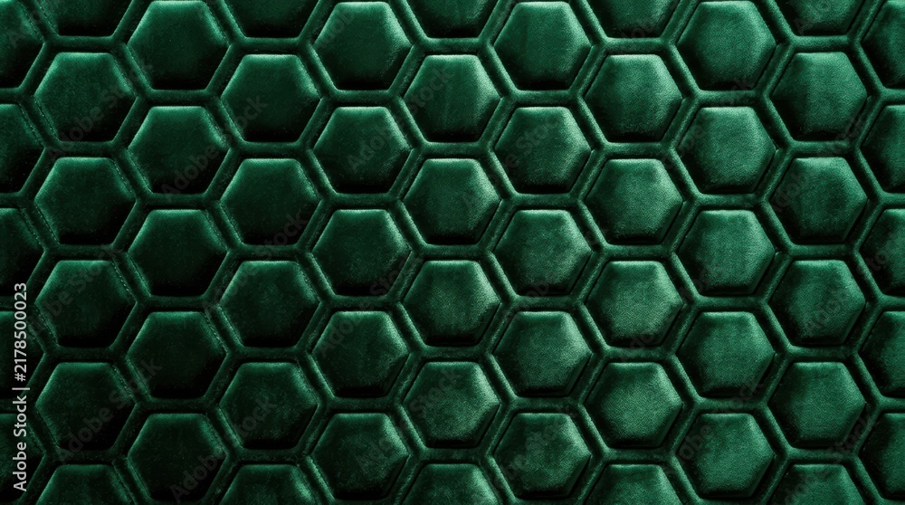Obraz premium Dark emerald green velvet features a sophisticated quilted honeycomb hexagon pattern with soft highlights and shadows