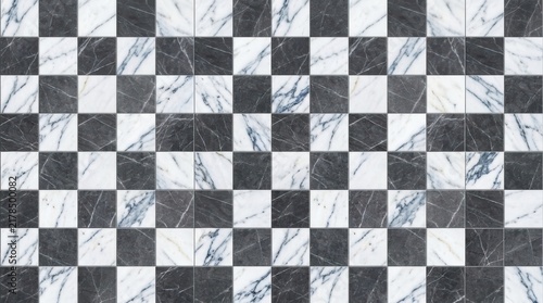 Black and white marble stone tiles arranged in a classic checkerboard pattern for modern interior flooring