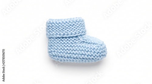 Cute Handmade Light Blue Knitted Wool Baby Bootie Isolated on White Background