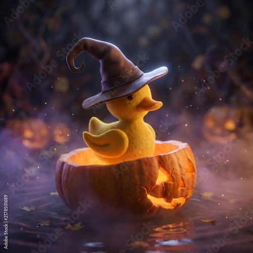 Cute duck wearing witch hat inside a glowing pumpkin