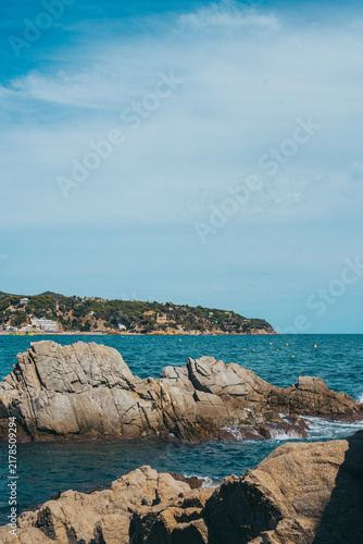 Scenic Rocky Coastline of Lloret de Mar with Castell d'en Plaja in Costa Brava, Spain