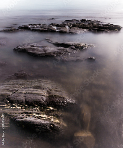 Wembury Coastline With The Tide Coming In In Long Exposure