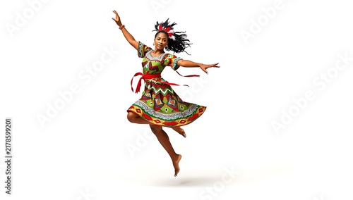 Joyful young woman wearing a colorful traditional patterned dress jumping