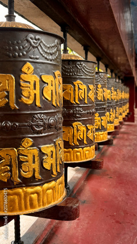 Obraz na płótnie buddhist prayer wheels in temple