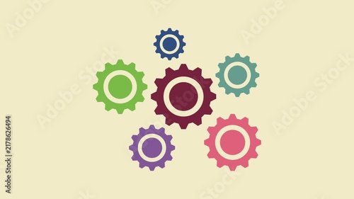 Animated loading video featuring several rotating pastel-colored gears.