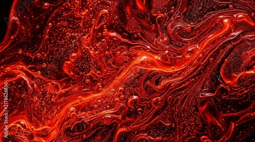 Abstract red liquid paint swirl texture background. Flowing glossy fluid art with bubbles and waves. Dynamic molten acrylic texture for wallpaper, banner, poster and creative design.