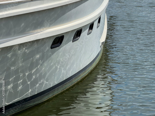 Luxury Yacht Hull Detail with Water Reflections Moored at Antwerp, Belgium Marina