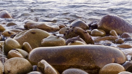 Foto Rocky stone beach on the wild Black Sea coast.