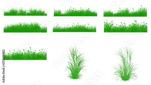Set of green grass silhouettes and tufts on a white background, design elements for nature and landscape concepts