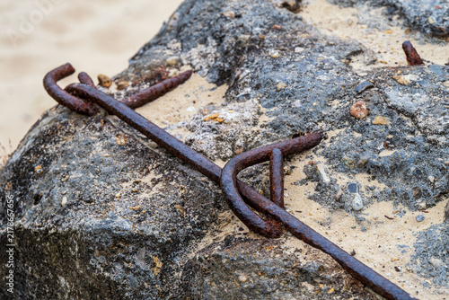 Obraz na plátně Destroyed WWII German concrete bunker remnants with rusty rebar in the sand at the Tirpitz Battery area