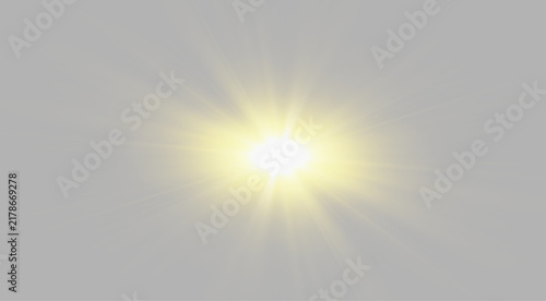 Fotografía An intense yellow light burst radiates from the center of the image
