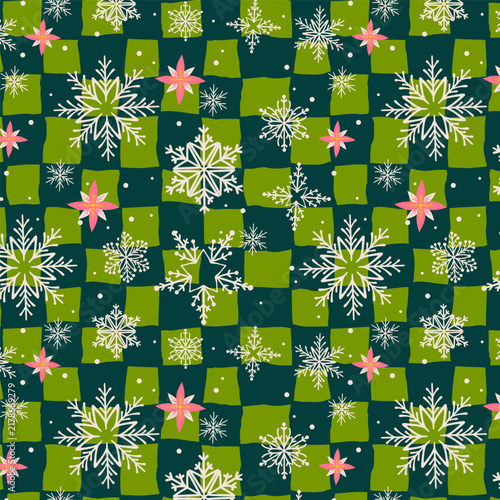 Christmas Snowflake and Poinsettia Checkered Seamless Pattern in Hand Drawn Style. Winter holiday vector illustration with green grid background and bulky brush lines perfect for cards, print, banner