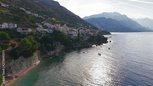 Aerial view of Pisak coastal town, Adriatic Sea and mountains at sunrise, Croatia