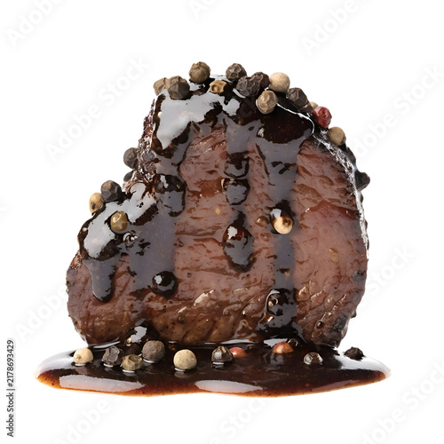 Grilled Beef Steak with Peppercorn Sauce Isolated on White Background