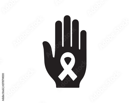 Breast cancer awareness ribbon in open hand silhouette
