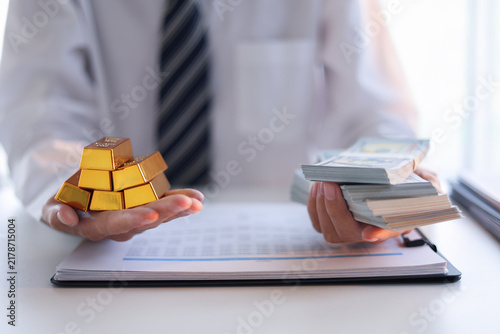 Canvastavla Businessman investing in gold to diversify portfolios hedge against inflation and currency depreciation