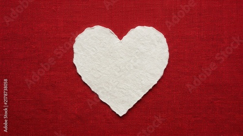 Simple White Heart On Red Textured Background For Valentines Day